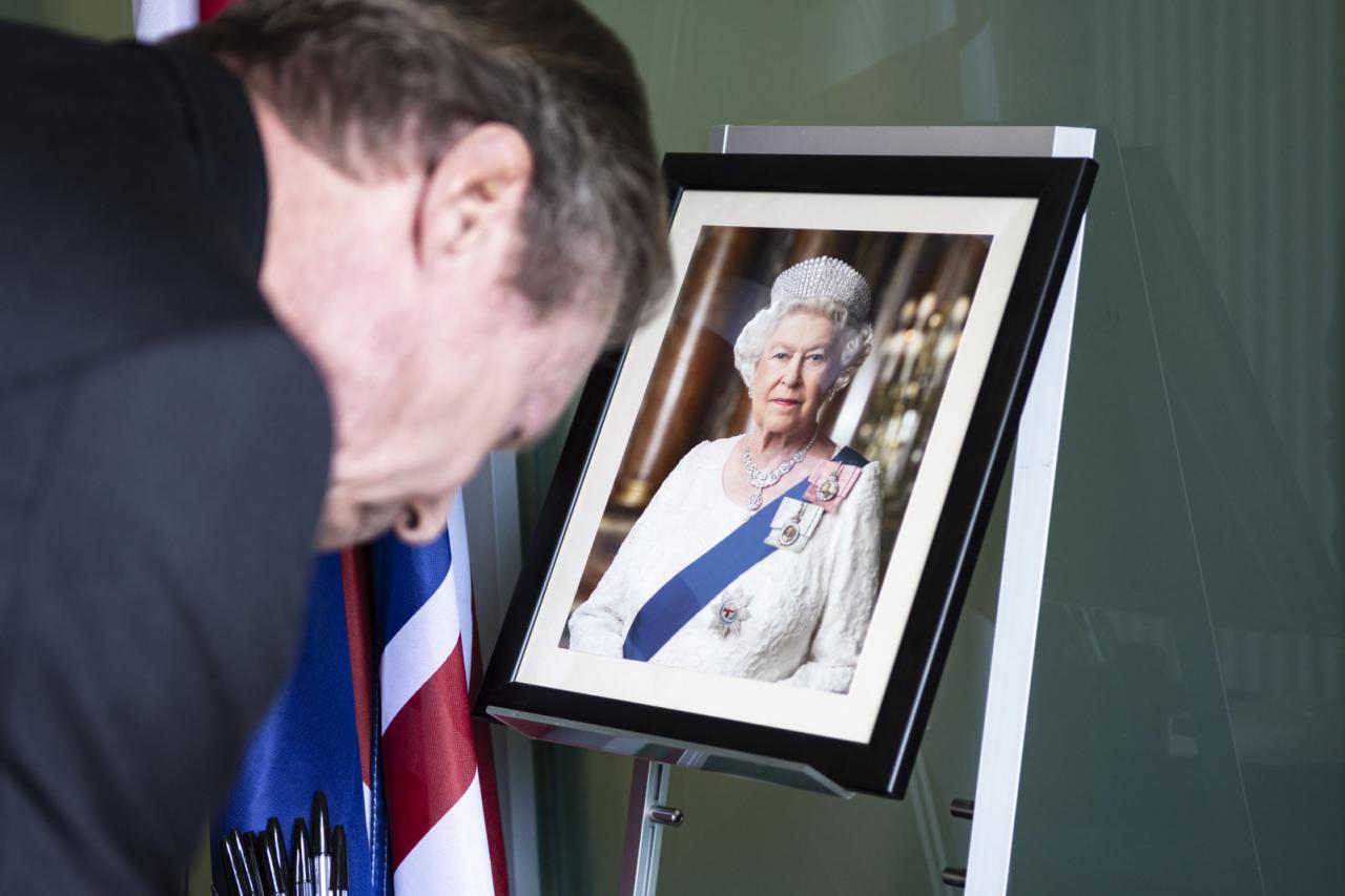 The portrait of Queen Elizabeth at the entrance of the Embassy