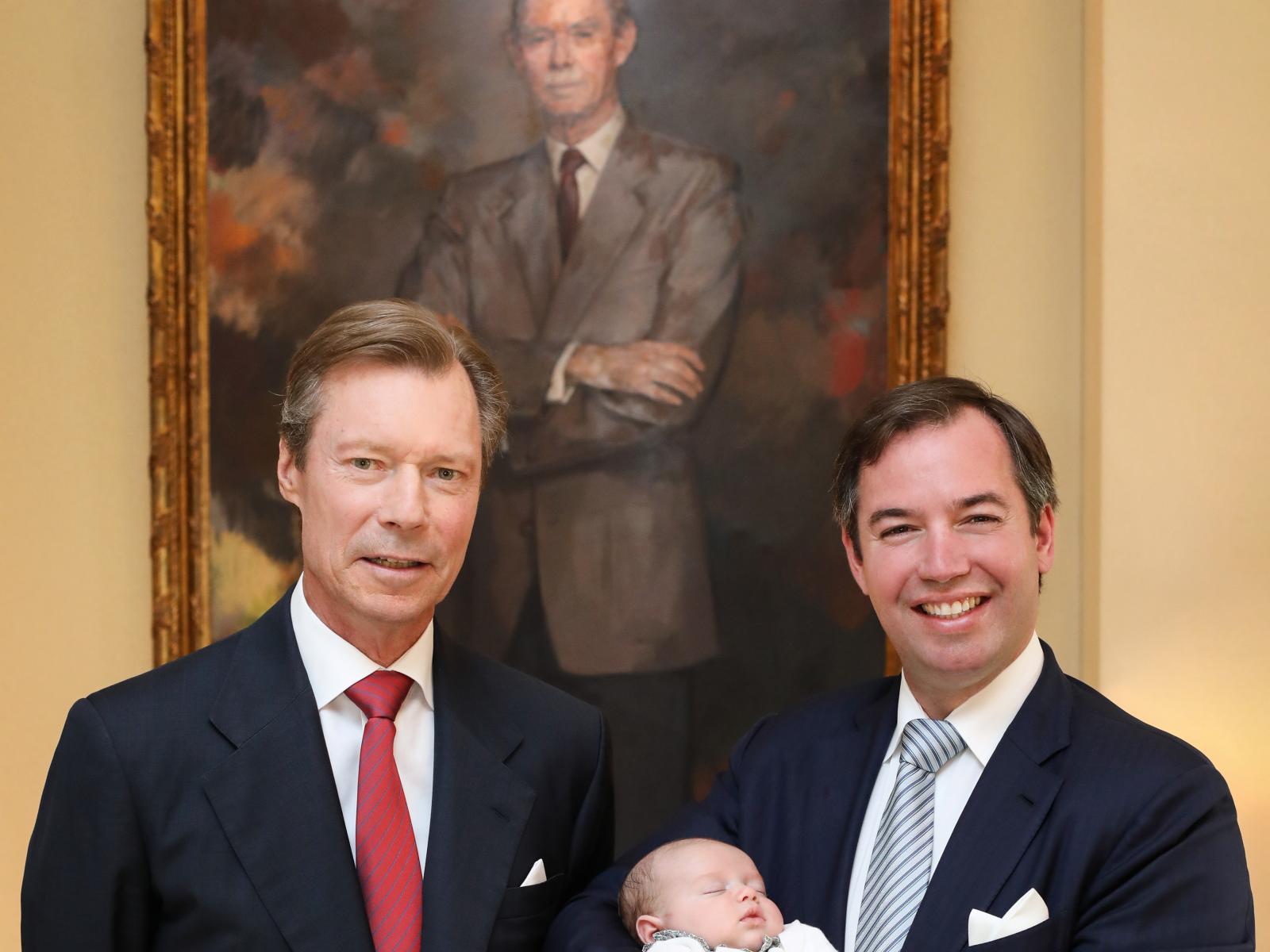 Four generations: The Grand Duke, the Hereditary Grand Duke and Prince Charles in front of the portrait of Grand Duke Jean