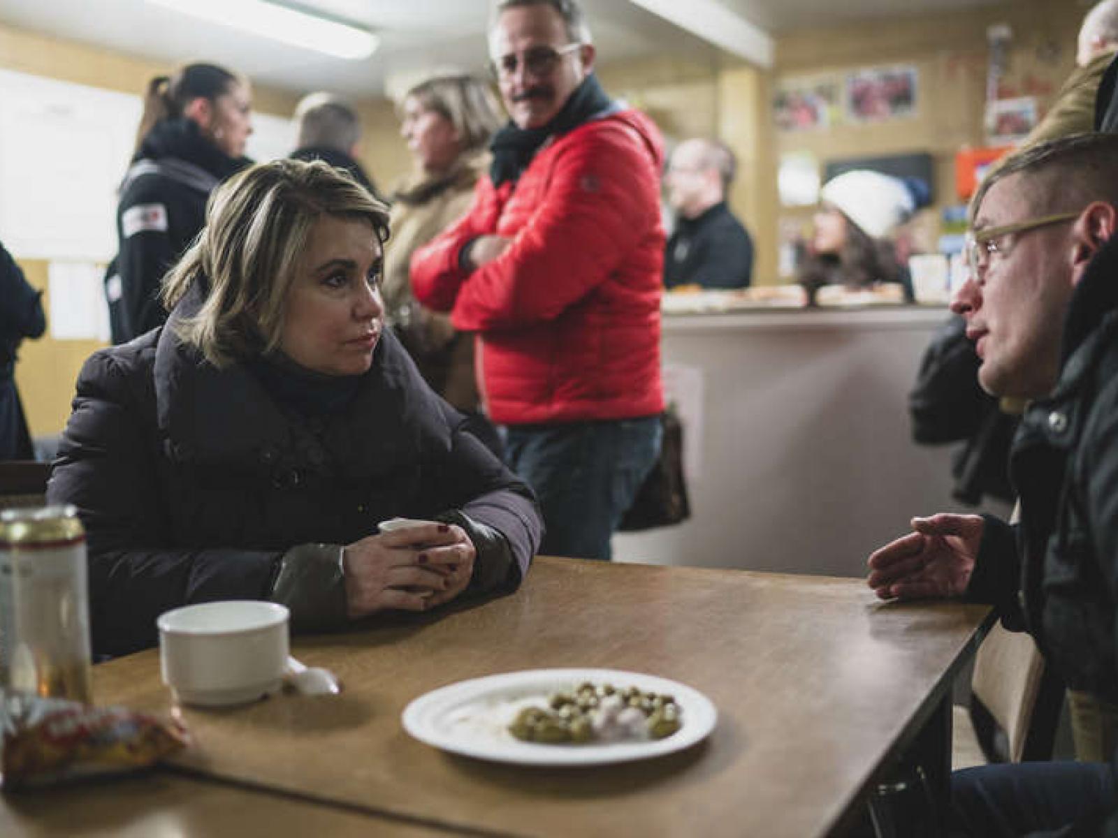 The Grand Duchess talking to homeless people