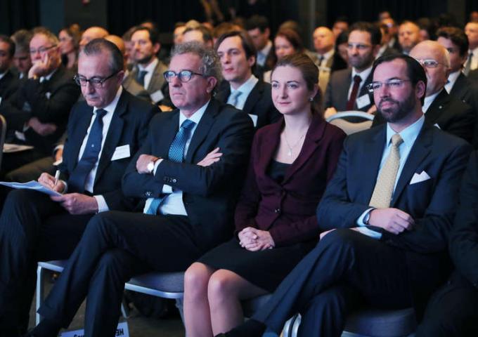 Le Couple héritier lors d'une conférence dans le cadre de la mission financière en Italie
